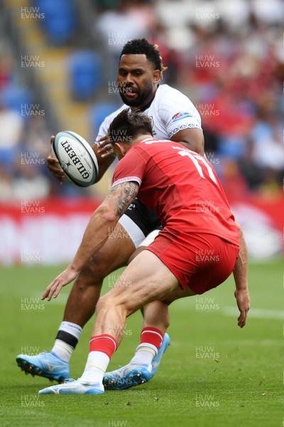 040726 - Fiji v Wales - Nations Championship - Vilimoni Botitu of Fiji is challenged by Josh Adams of Wales