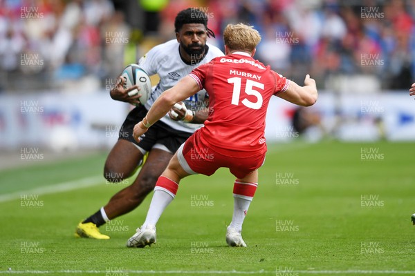 040726 - Fiji v Wales - Nations Championship - Kalaveti Ravouvou of Fiji is challenged by Blair Murray of Wales