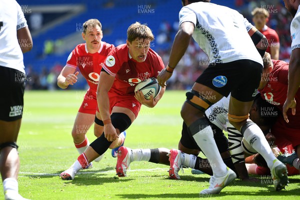 040726 - Fiji v Wales - Nations Championship - Alex Mann of Wales is challenged by Kitione Salawa of Fiji