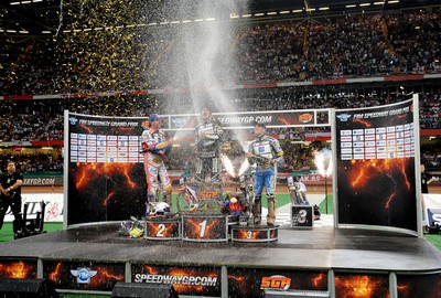 10.07.10 - FIM British Speedway Grand Prix The winners celebrate on the podium L-R: Jason Crump (2nd) Chris Holder (1st) Jaroslaw Hampbel (3rd) 