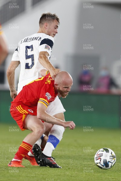 030920 - Finland v Wales - UEFA Nations League - Jonny Williams of Wales is tackled by Leo Vaisanen of Finland