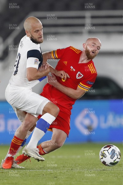 030920 - Finland v Wales - UEFA Nations League - Jonny Williams of Wales is tackled by Teemu Pukki of Finland