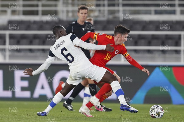 030920 - Finland v Wales - UEFA Nations League - Harry Wilson of Wales is tackled by Glen Kamara