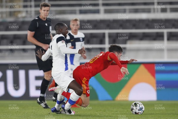 030920 - Finland v Wales - UEFA Nations League - Harry Wilson of Wales is tackled by Glen Kamara