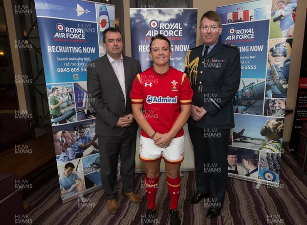 100216 - First WRU professional female rugby player - Wales flanker Sian Williams who has been awarded Elite Athlete Status by the RAF making her the first full-time professional Welsh female rugby player, along with WRU Group Chief Executive Martyn Phillips, and Air Commodore Adrian Williams, Air Officer for Wales