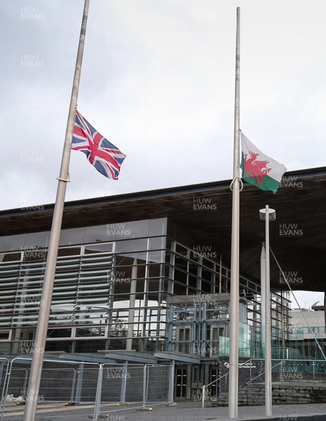 090421 The Union Flag and Welsh flag are flown at half mast at The Welsh Parliament's Senedd in Cardiff Bay, after the announcement of the death of HRH The Duke of Edinburgh by Buckingham Palace