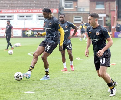 260425 - Fleetwood Town v Newport County - Sky Bet League 2 - David Ajiboye warms up alongside Kyle Hudlin of Newport with David Ajiboye of Newport