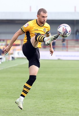 260425 - Fleetwood Town v Newport County - Sky Bet League 2 - Shane McLoughlin of Newport stops the cross
