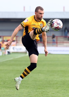 260425 - Fleetwood Town v Newport County - Sky Bet League 2 - Shane McLoughlin of Newport stops the cross