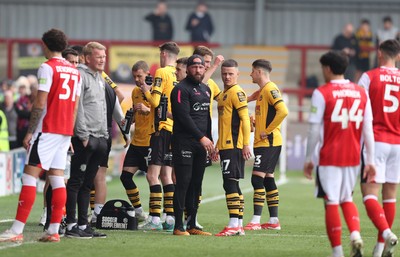 260425 - Fleetwood Town v Newport County - Sky Bet League 2 - Players are taken off the pitch due to illness in the home fans section