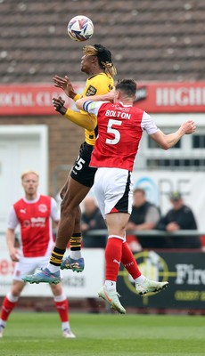 260425 - Fleetwood Town v Newport County - Sky Bet League 2 - Kyle Hudlin of Newport and James Bolton of Fleetwood