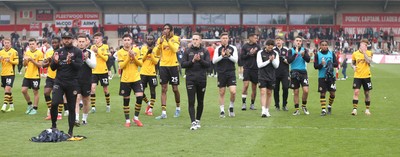 260425 - Fleetwood Town v Newport County - Sky Bet League 2 - Newport team applaud the travelling fans at the end of the game
