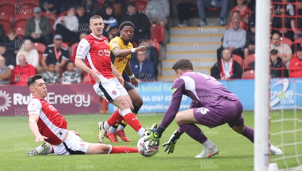 260425 - Fleetwood Town v Newport County - Sky Bet League 2 - Goalkeeper Jay Lynch of Fleetwood saves from a long shot by Bobby Kamwa of Newport