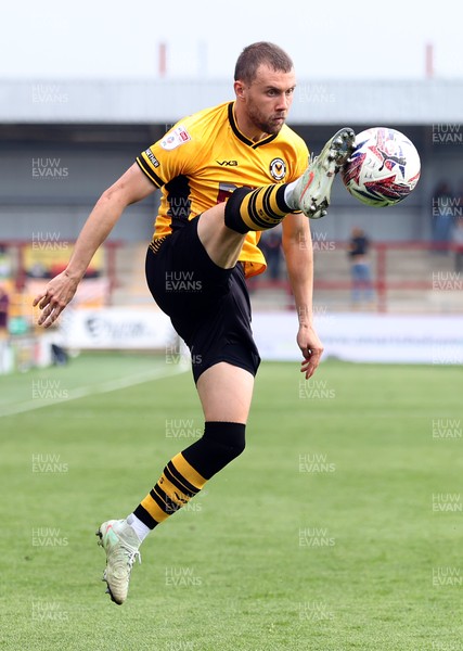 260425 - Fleetwood Town v Newport County - Sky Bet League 2 - Shane McLoughlin of Newport stops the cross