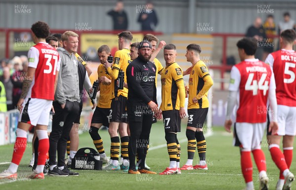 260425 - Fleetwood Town v Newport County - Sky Bet League 2 - Players are taken off the pitch due to illness in the home fans section