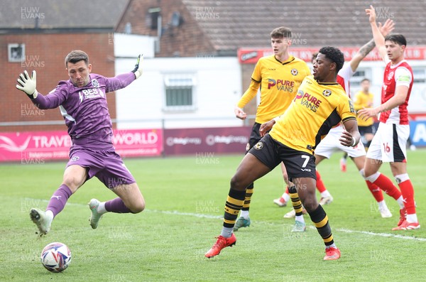 260425 - Fleetwood Town v Newport County - Sky Bet League 2 - Goalkeeper Jay Lynch of Fleetwood stops a shot on goal by Bobby Kamwa of Newport