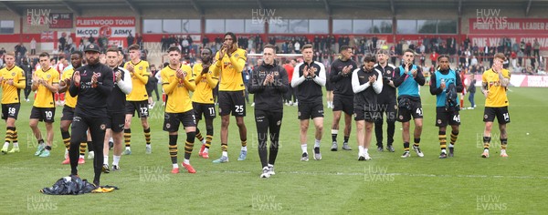 260425 - Fleetwood Town v Newport County - Sky Bet League 2 - Newport team applaud the travelling fans at the end of the game
