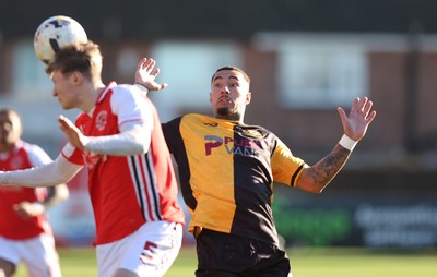 280226 - Fleetwood Town v Newport County - Sky Bet League 2 - Courtney Baker-Richardson of Newport and Finley Potter of Fleetwood