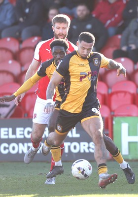 280226 - Fleetwood Town v Newport County - Sky Bet League 2 - Courtney Baker-Richardson of Newport and Nathan Opoku of Newport