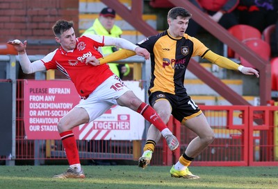 280226 - Fleetwood Town v Newport County - Sky Bet League 2 - James Crole of Newport and Mark Helm of Fleetwood