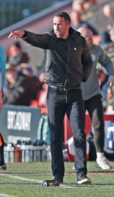 280226 - Fleetwood Town v Newport County - Sky Bet League 2 - Newport manager Christian Fuchs directs team from technical area