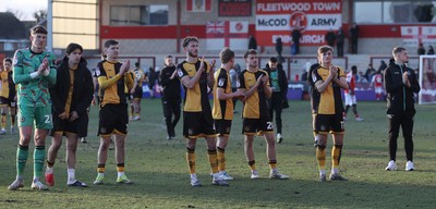 280226 - Fleetwood Town v Newport County - Sky Bet League 2 - Team applaud the travelling fans at the end of the match