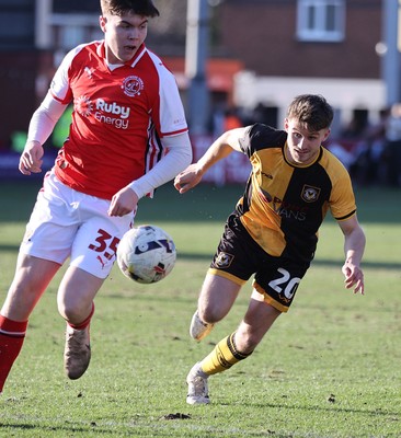 280226 - Fleetwood Town v Newport County - Sky Bet League 2 - Ben Lloyd of Newport and Conor Haughey of Fleetwood