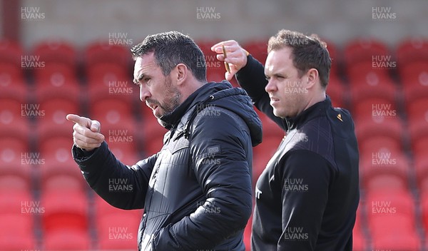 280226 - Fleetwood Town v Newport County - Sky Bet League 2 - Newport manager Christian Fuchs and assistant manager Mark Smith before the game