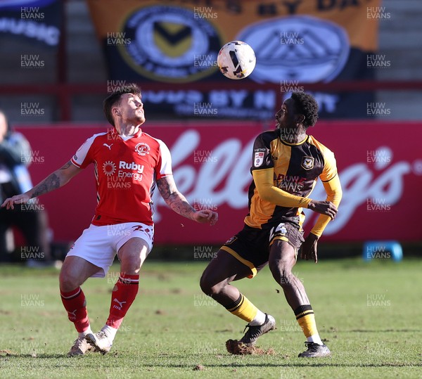 280226 - Fleetwood Town v Newport County - Sky Bet League 2 - Nathan Opoku of Newport and Mitchell Clark of Fleetwood