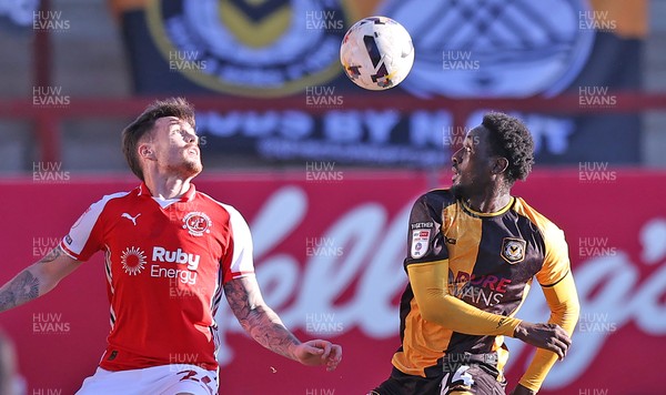 280226 - Fleetwood Town v Newport County - Sky Bet League 2 - Nathan Opoku of Newport and Mitchell Clark of Fleetwood