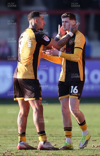 280226 - Fleetwood Town v Newport County - Sky Bet League 2 - Courtney Baker-Richardson of Newport welcomes on to pitch in 2nd half, James Crole of Newport sub
