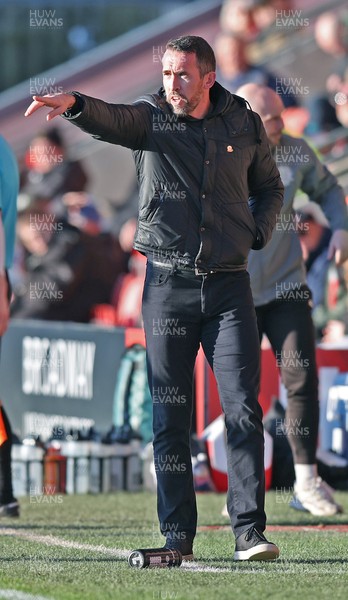 280226 - Fleetwood Town v Newport County - Sky Bet League 2 - Newport manager Christian Fuchs directs team from technical area
