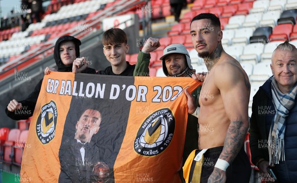 280226 - Fleetwood Town v Newport County - Sky Bet League 2 - Courtney Baker-Richardson of Newport with fans at the end of the match