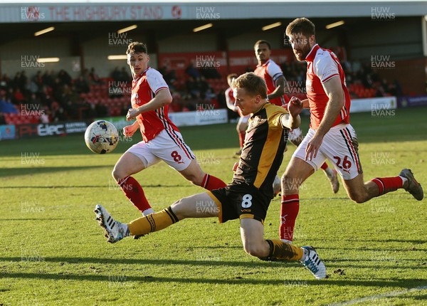 280226 - Fleetwood Town v Newport County - Sky Bet League 2 - Matthew Smith of Newport in goalmouth followed by Shaun Rooney of Fleetwood and Matty Virtue of Fleetwood
