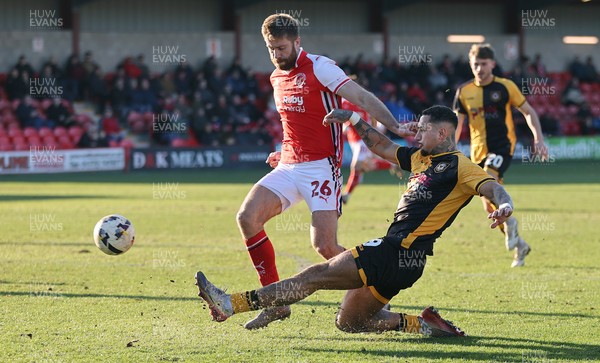 280226 - Fleetwood Town v Newport County - Sky Bet League 2 - Courtney Baker-Richardson of Newport takes the ball from Shaun Rooney of Fleetwood