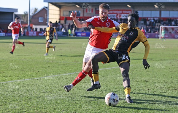 280226 - Fleetwood Town v Newport County - Sky Bet League 2 - Nathan Opoku of Newport and Shaun Rooney of Fleetwood