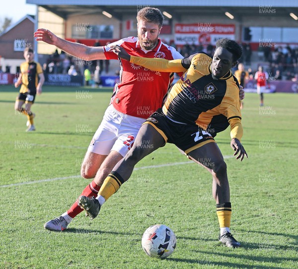 280226 - Fleetwood Town v Newport County - Sky Bet League 2 - Nathan Opoku of Newport and Shaun Rooney of Fleetwood