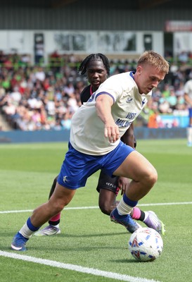 250726 - Forest Green Rovers v Cardiff City, Pre-Season Friendly - Isaak Davies of Cardiff City holds off Sydney Agina of Forest Green Rovers