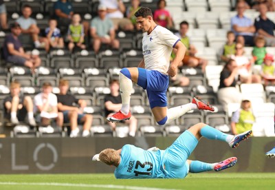 250726 - Forest Green Rovers v Cardiff City, Pre-Season Friendly - Yousef Salech of Cardiff City is denied by Forest Green Rovers goalkeeper Fiachra Pagel