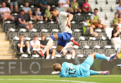 250726 - Forest Green Rovers v Cardiff City, Pre-Season Friendly - Yousef Salech of Cardiff City is denied by Forest Green Rovers goalkeeper Fiachra Pagel