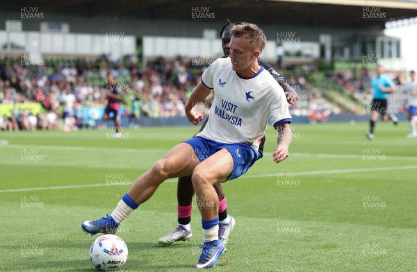 250726 - Forest Green Rovers v Cardiff City, Pre-Season Friendly - Isaak Davies of Cardiff City holds off Sydney Agina of Forest Green Rovers