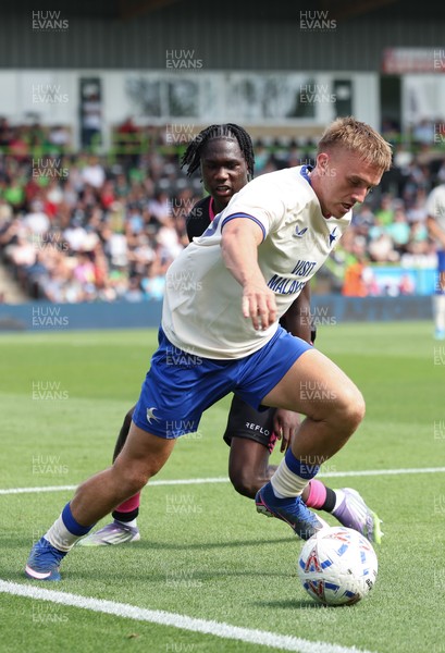 250726 - Forest Green Rovers v Cardiff City, Pre-Season Friendly - Isaak Davies of Cardiff City holds off Sydney Agina of Forest Green Rovers