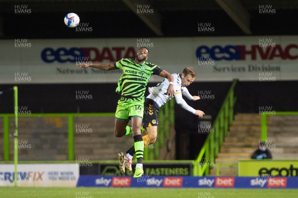 011220 - Forest Green Rovers v Newport County - Sky Bet League 2 - Jamille Matt of Forest Green and Mickey Demetriou of Newport County compete for the ball