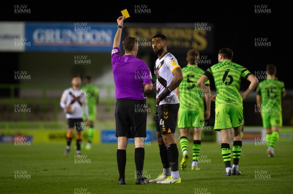 011220 - Forest Green Rovers v Newport County - Sky Bet League 2 - Joss Labadie of Newport County is booked by referee Ben Toner
