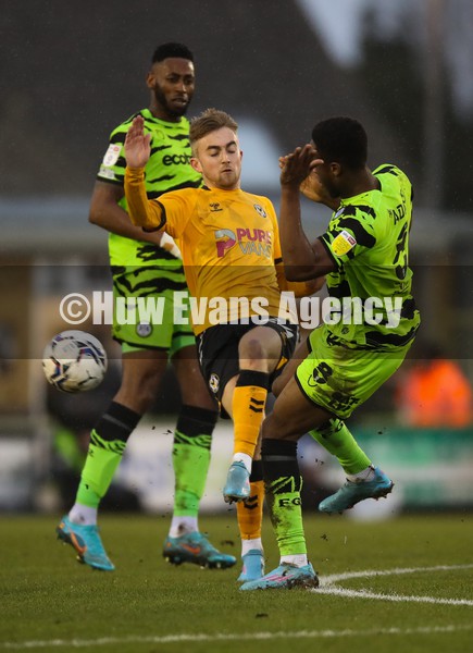 050222 - Forest Green Rovers v Newport County, Sky Bet League 2 - Jake Cain of Newport County is challenged by Ebou Adams of Forest Green Rovers
