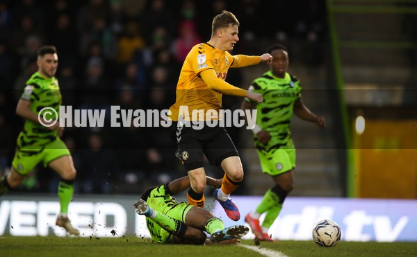 050222 - Forest Green Rovers v Newport County, Sky Bet League 2 - Rob Street of Newport County is tackled by Ebou Adams of Forest Green Rovers on the edge on the penalty area