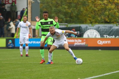 061018 - Forest Green Rovers v Newport County - EFL SkyBet League 2 - Dan Butler of Newport County fends off Tahvon Campbell of Forest Green Rovers