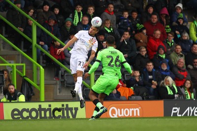 061018 - Forest Green Rovers v Newport County - EFL SkyBet League 2 - Tyler Forbes of Newport County beats Reuben Reid of Forest Green Rovers to a high ball