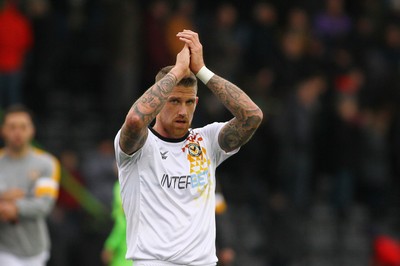 061018 - Forest Green Rovers v Newport County - EFL SkyBet League 2 - Scot Bennett of Newport County applauds the travelling fans after the game