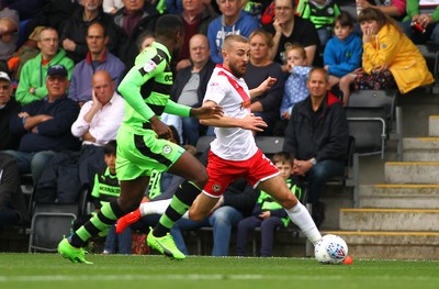 141017 Forest Green Rovers v Newport County - EFL SkyBet League 2 - Dan Butler of Newport County takes on Dale Bennett of Forest Green Rovers  